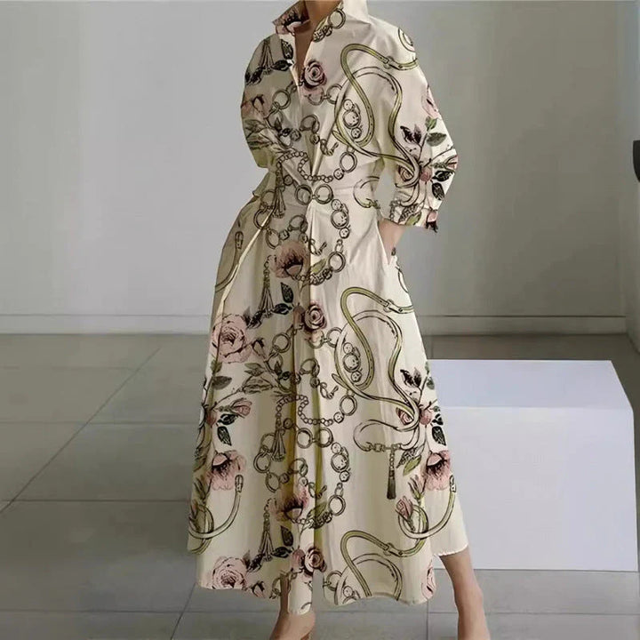 Front view of collared wrap maxi dress showing button placket and flowing skirt with print detail