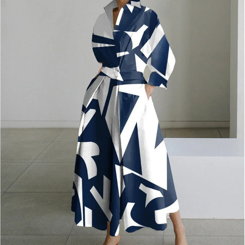 Detail shot of collared wrap maxi dress featuring buttoned cuffs and sleeve construction