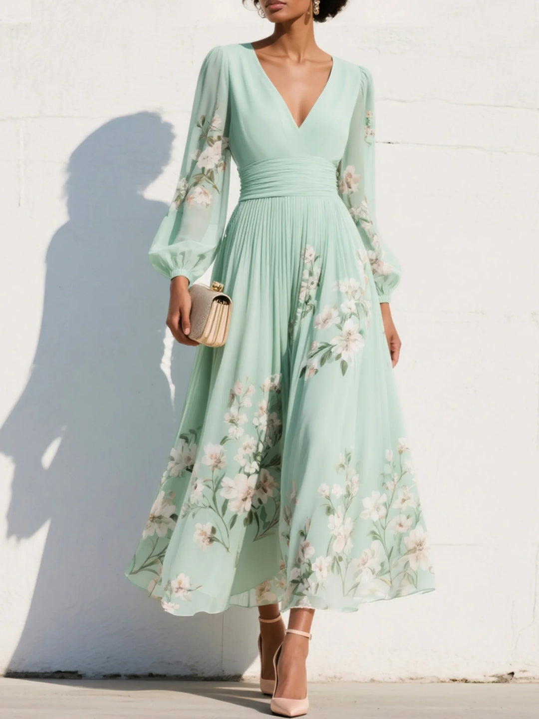 Floral midi dress with V-neckline, ruched waist, and sheer balloon sleeves in mint green with embroidered blooms