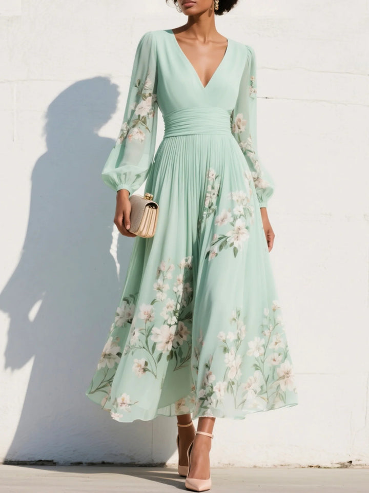 Floral midi dress with V-neckline, ruched waist, and sheer balloon sleeves in mint green with embroidered blooms