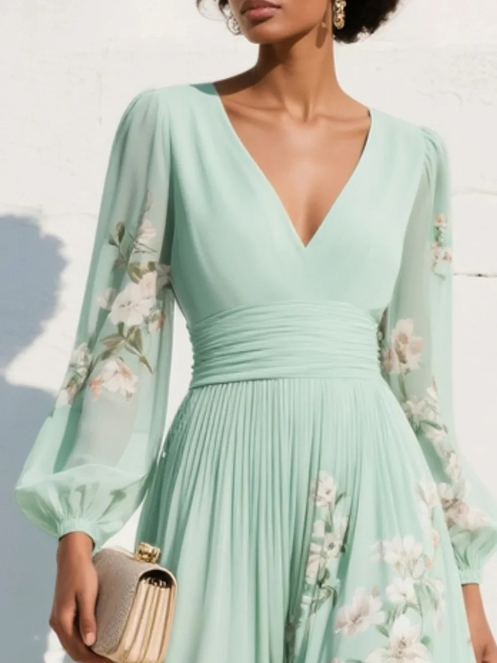 Back view of floral midi dress with V-neckline and cascading floral embroidery