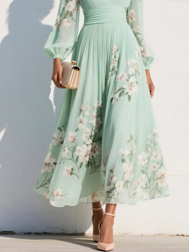 Full-length view of floral midi dress paired with neutral heels and clutch