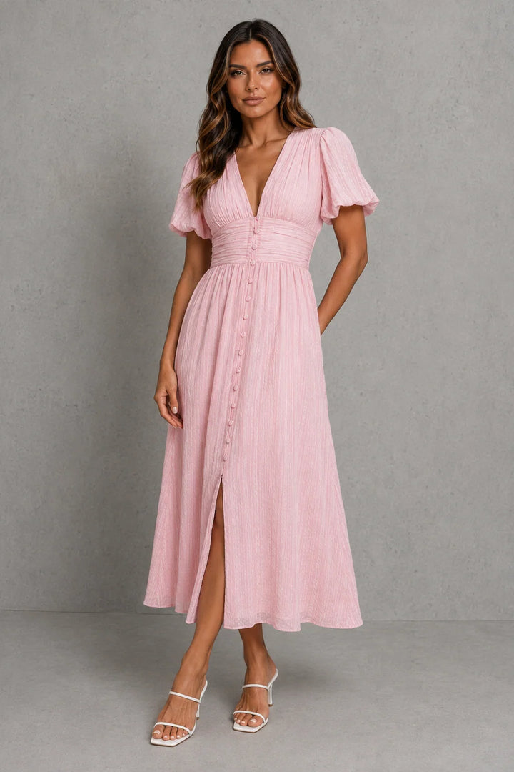 Casual summer dress featuring fitted waist, puff sleeves, and midi-length skirt in soft blue shade