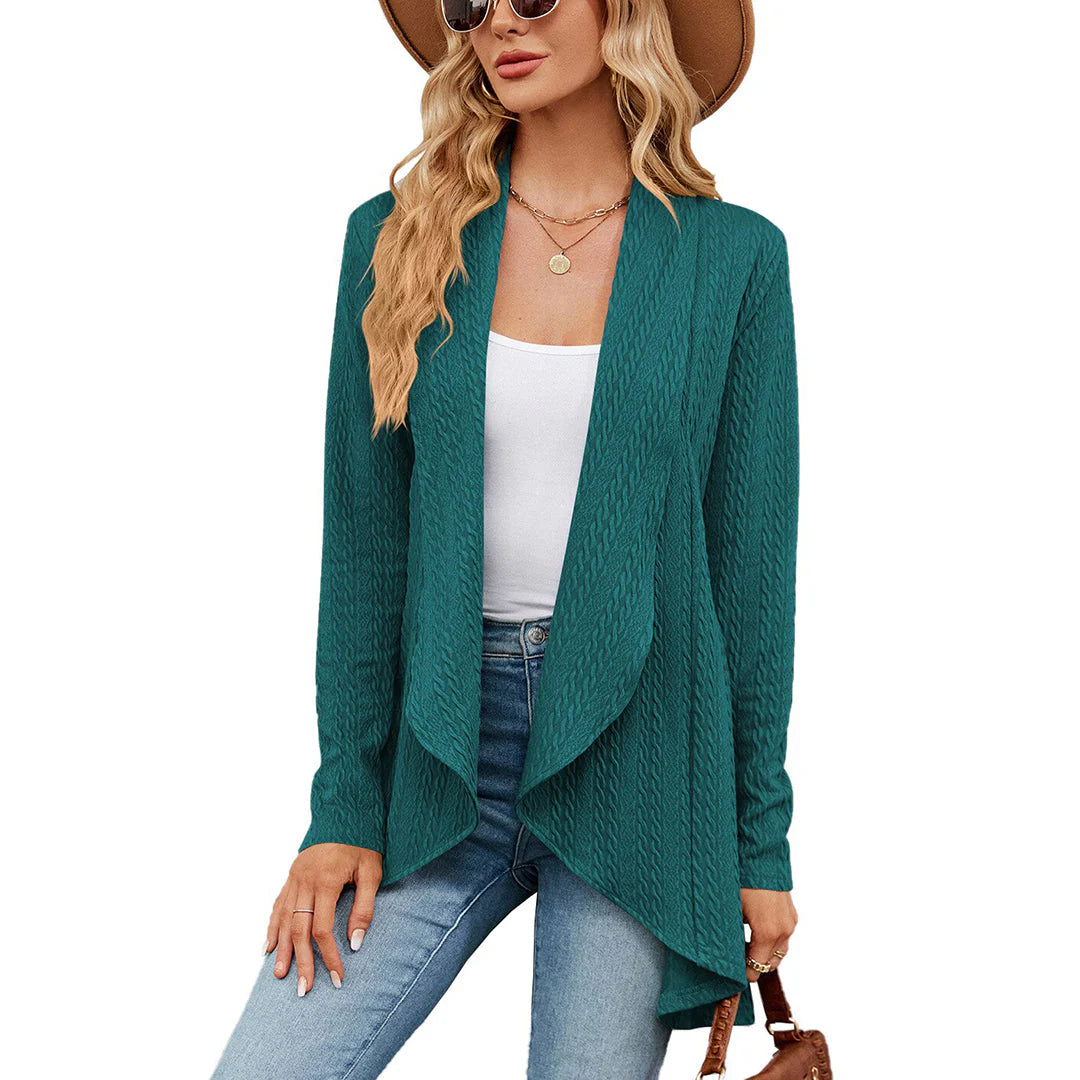 Women's cardigan in neutral apricot tone showing flowing drape and shawl collar