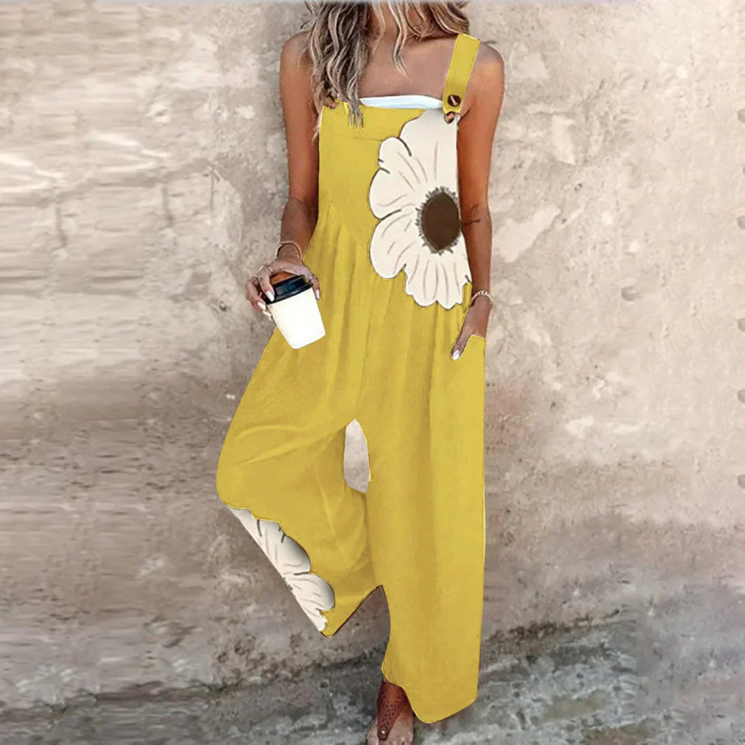 Adjustable strap dungarees with bold daisy print and comfortable wide leg cut