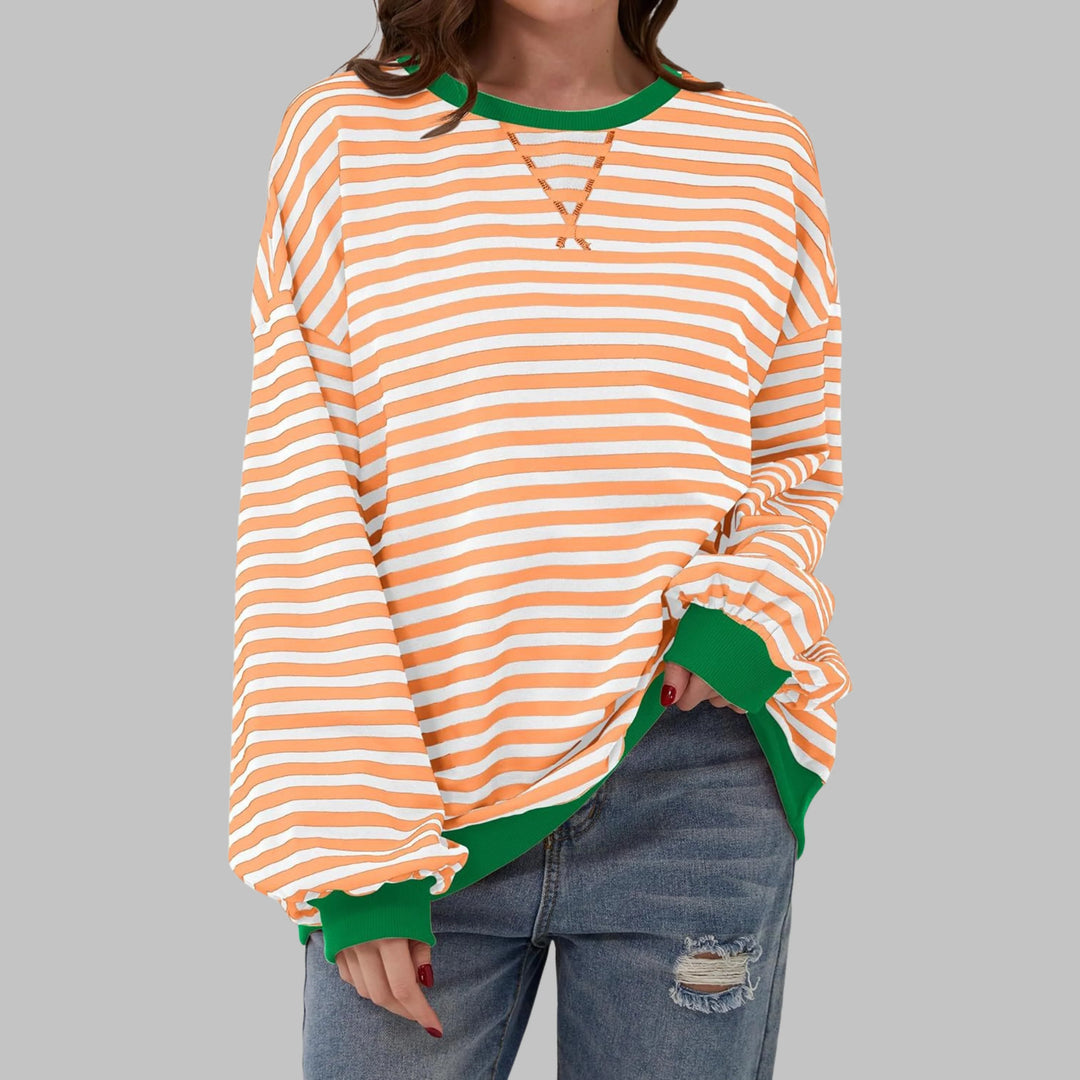 Women's casual long sleeve striped sweatshirt showing versatile styling options for relaxed weekend wear