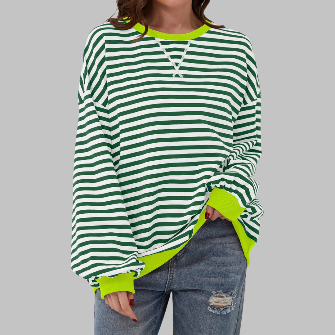 Close-up of contrast ribbed crew neck and sleeve cuffs on women's casual long sleeve striped sweatshirt