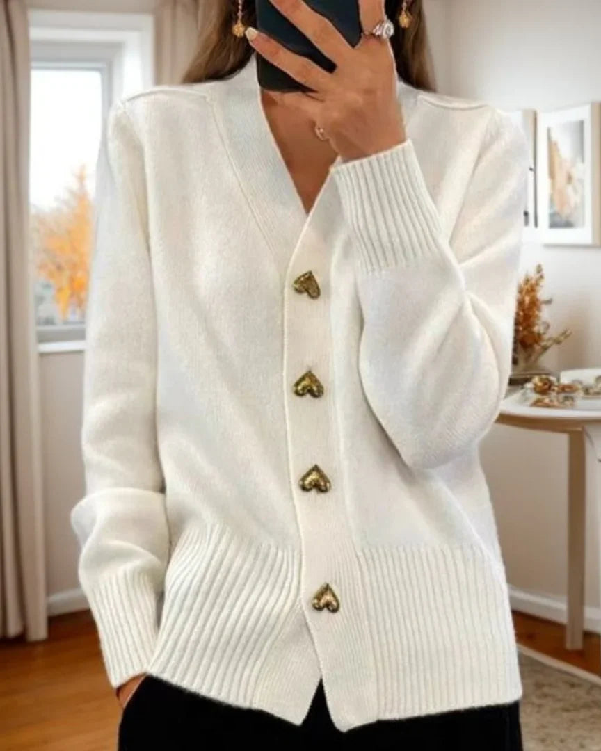 Women's V-neck cardigan in grey featuring decorative heart-shaped button fastening