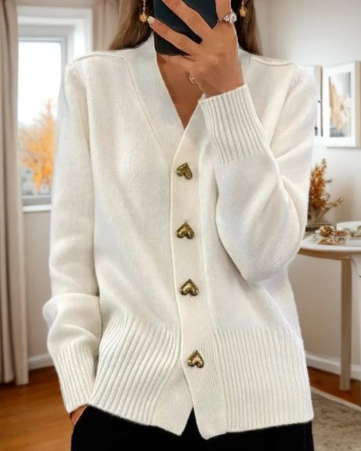 Women's V-neck cardigan in grey featuring decorative heart-shaped button fastening