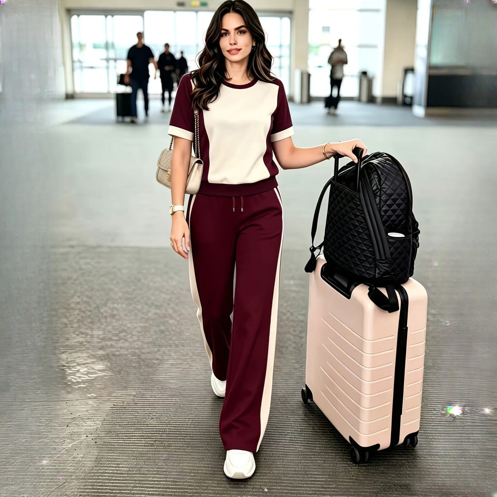 Women's colour-block top and trousers set in burgundy, worn on model