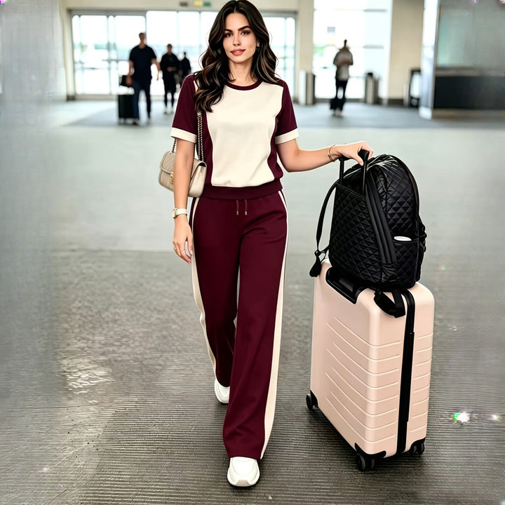 Women's colour-block top and trousers set in burgundy, worn on model