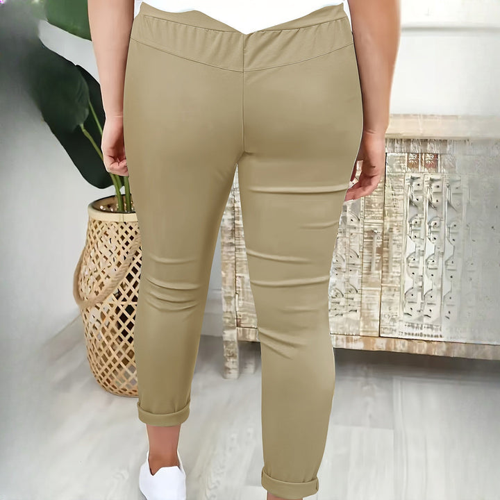 Women's drawstring tapered trousers in khaki, back view
