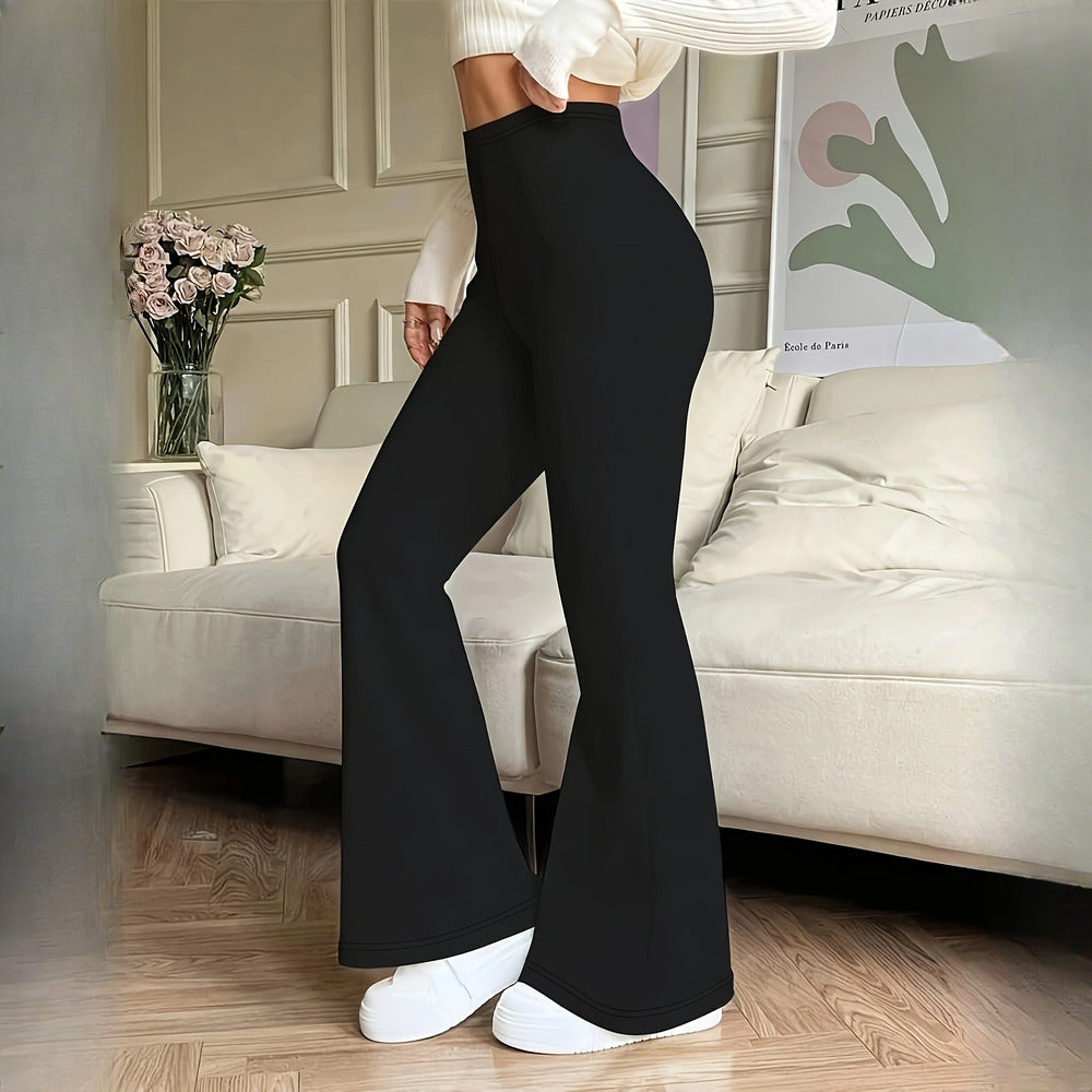 Women's high-waist flare trousers, styled look