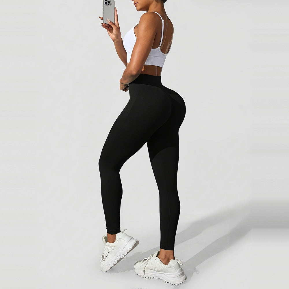 Women's high-waist shaping leggings in black, side view