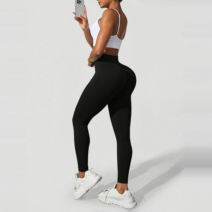 Women's high-waist shaping leggings in black, side view