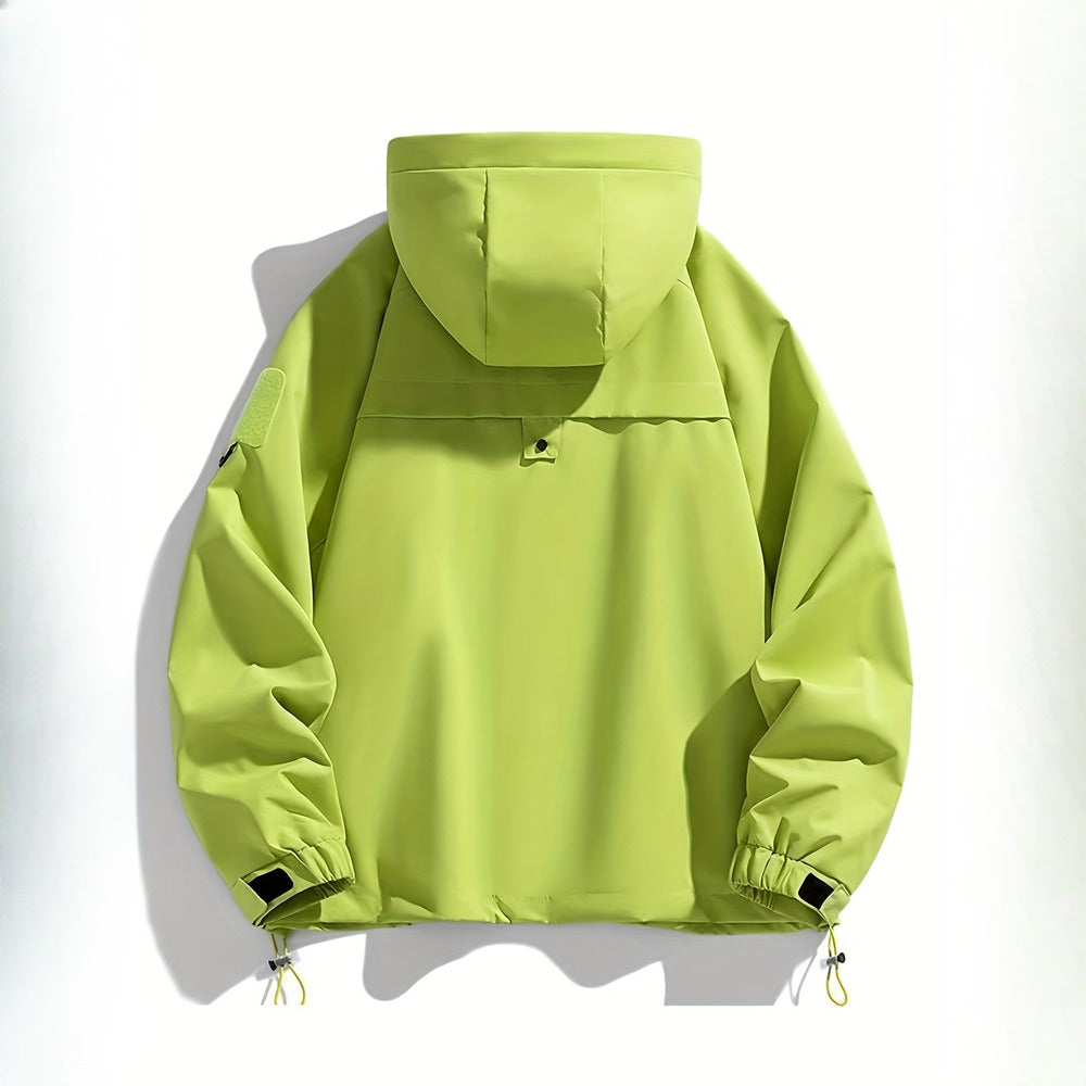 Women's windproof hooded mountain jacket in lime green, back view