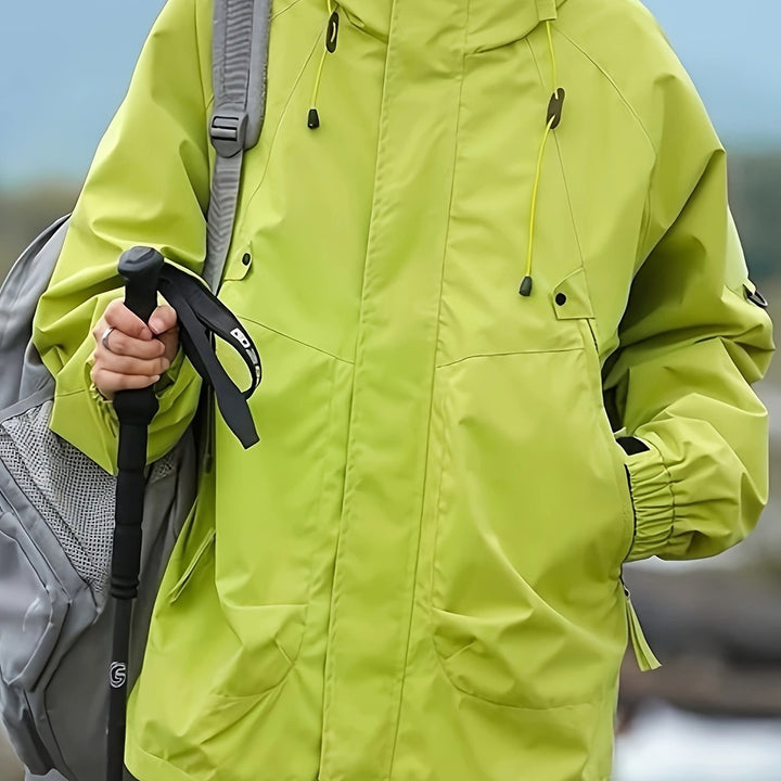 Women's windproof hooded mountain jacket in lime green