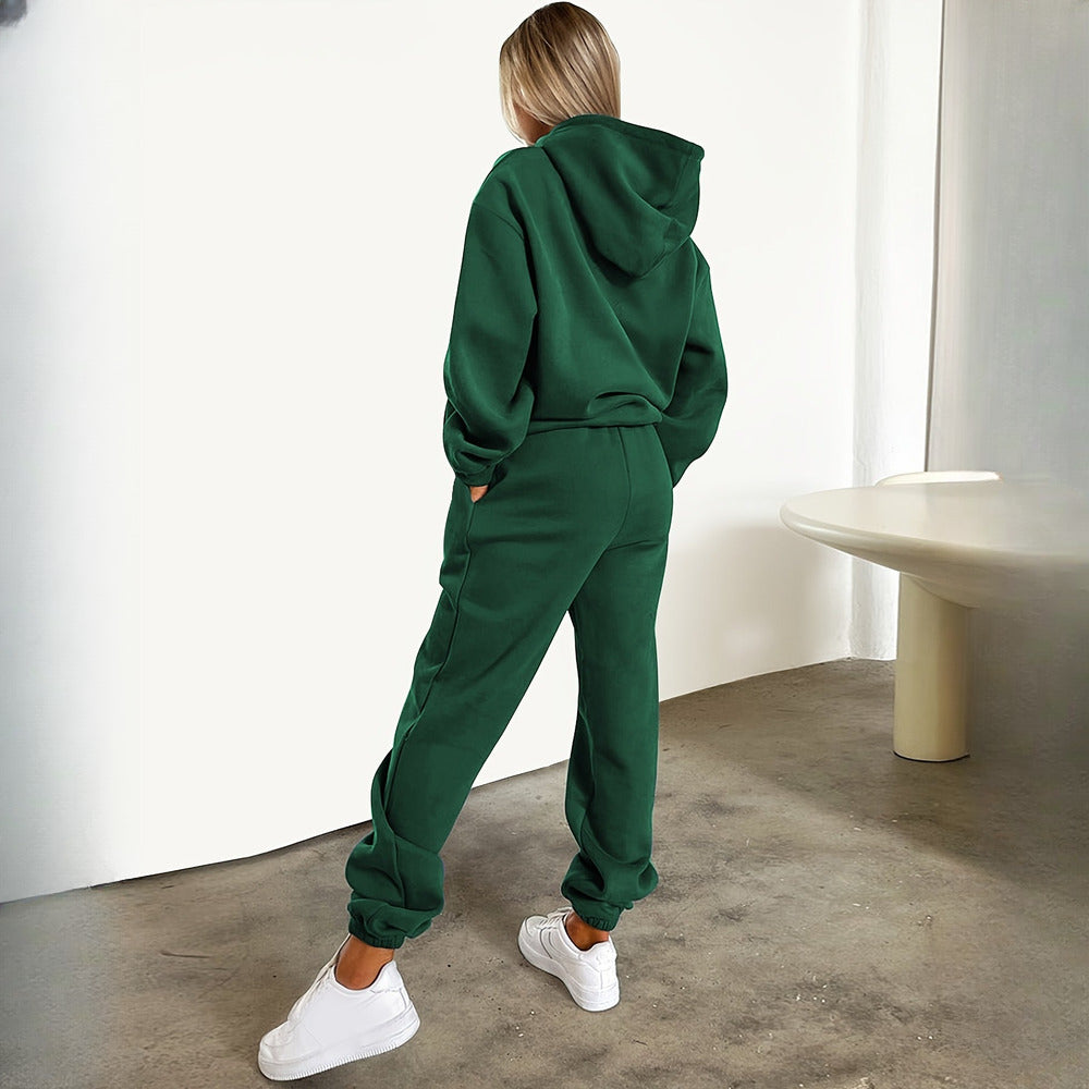 Women's hooded tracksuit set in dark green, back view