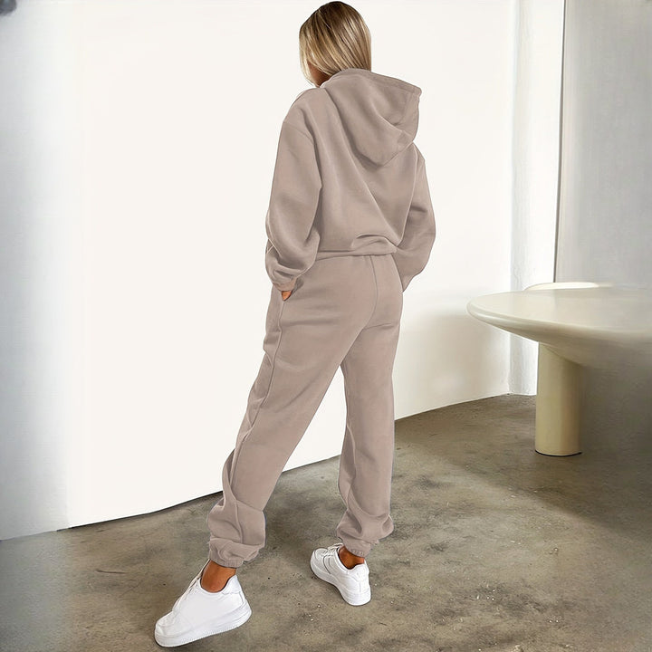 Women's hooded tracksuit set in taupe, back view