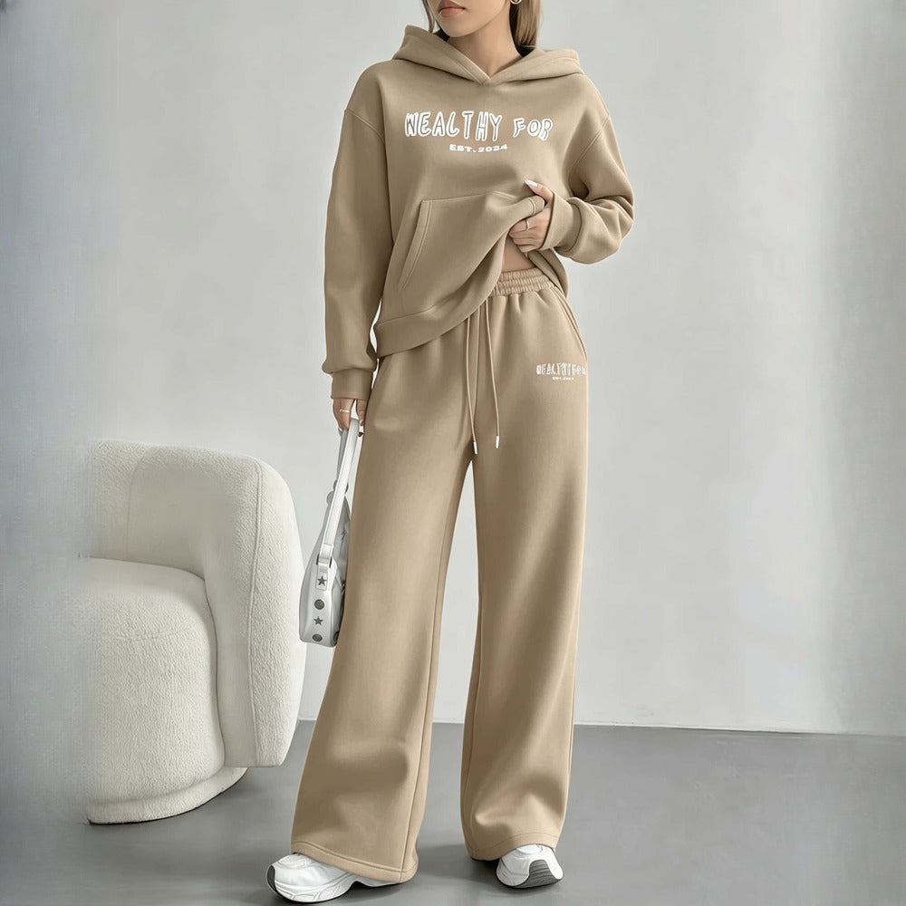 Women's hoodie and wide-leg trousers set in beige, worn on model