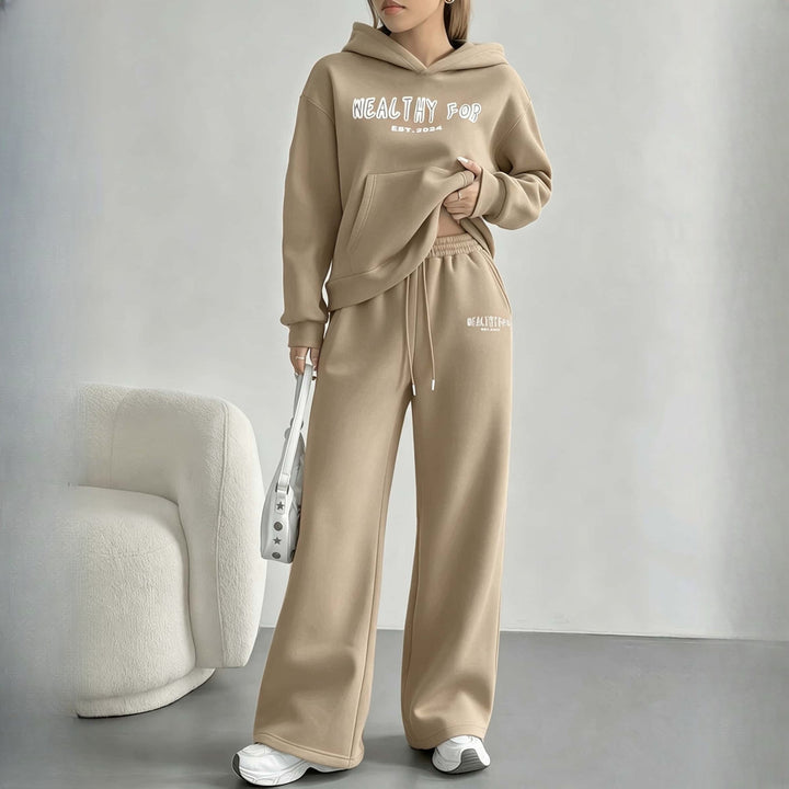 Women's hoodie and wide-leg trousers set in beige, worn on model