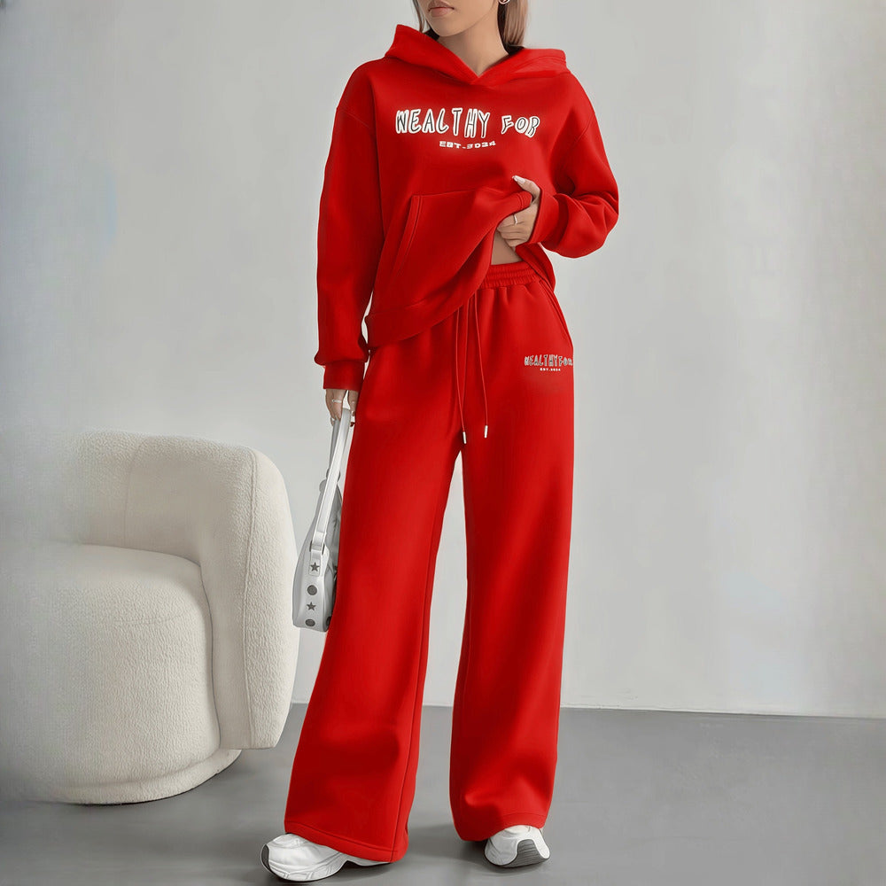 Women's hoodie and wide-leg trousers set in red, worn on model