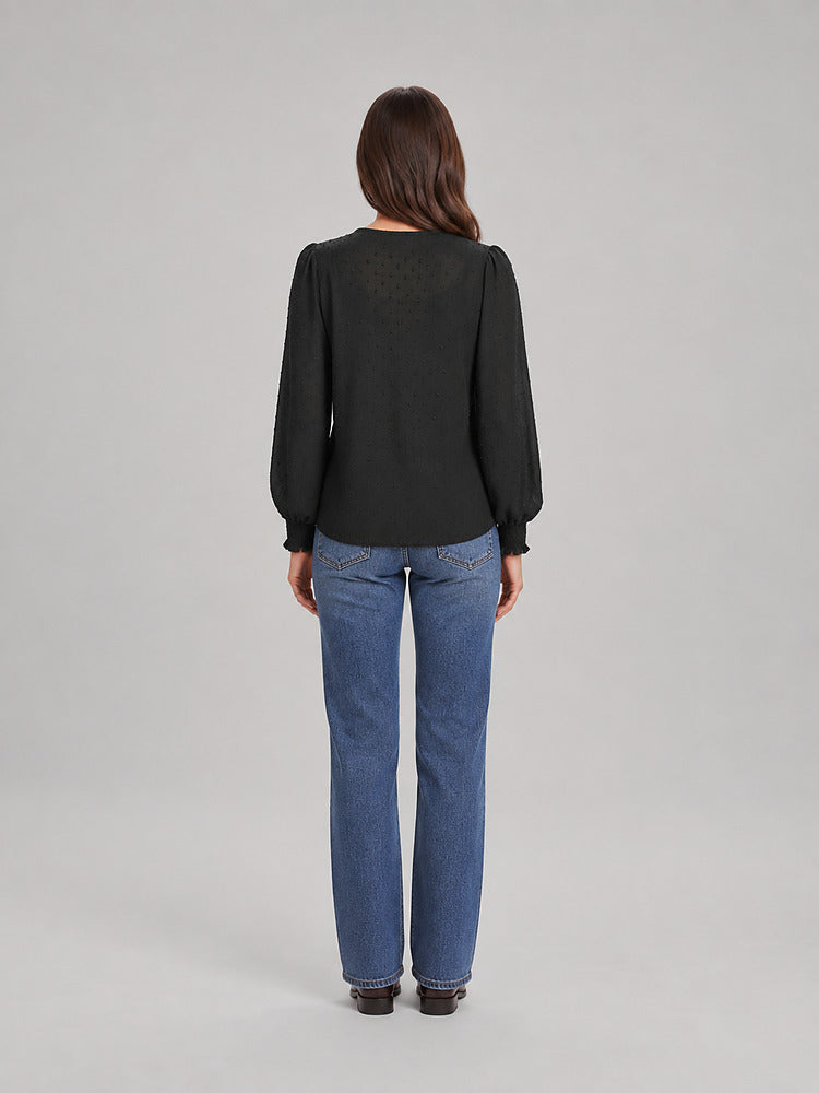 Women's blouse with an openwork front panel and long sleeves