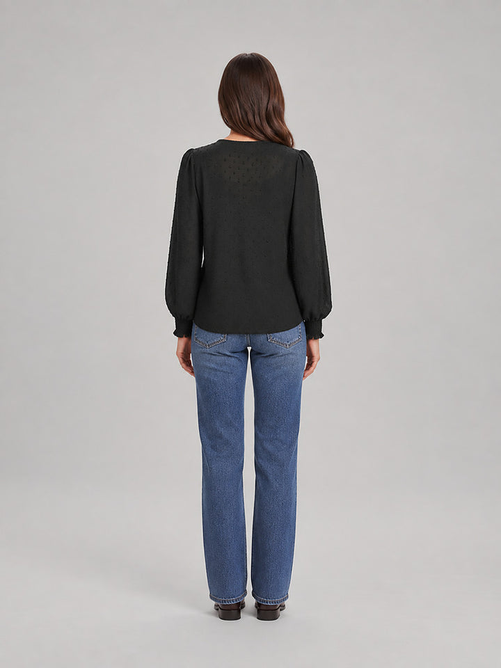 Women's blouse with an openwork front panel and long sleeves