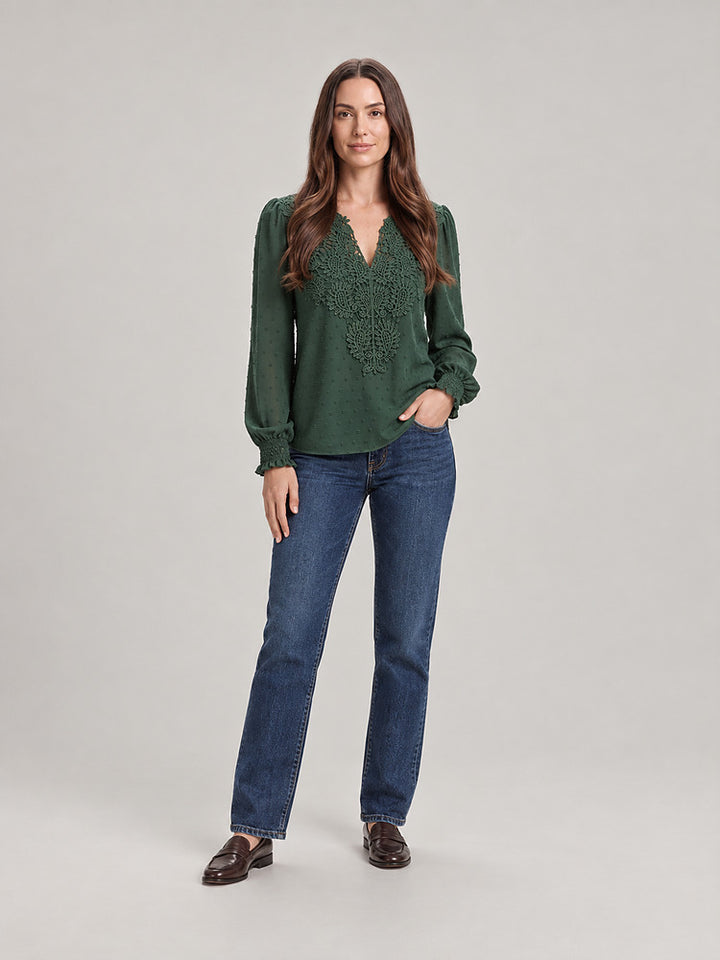 Women's blouse with an openwork front panel and long sleeves in emerald green