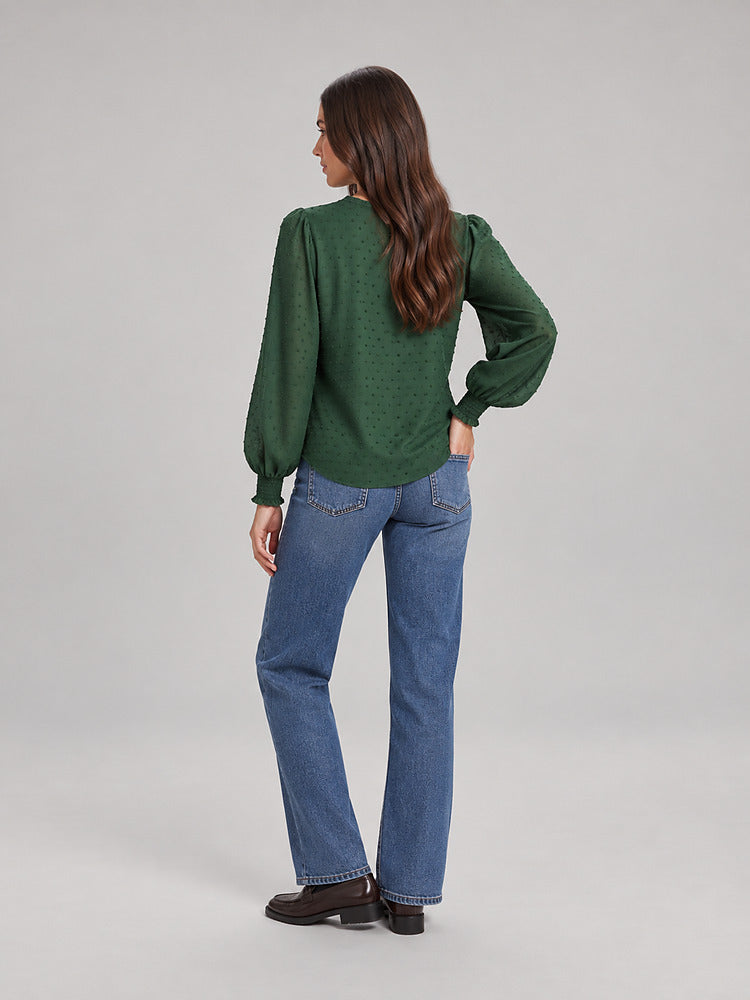 Women's blouse with an openwork front panel and long sleeves