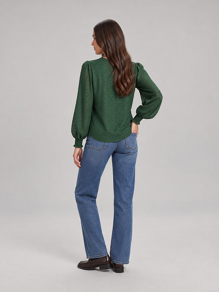 Women's blouse with an openwork front panel and long sleeves