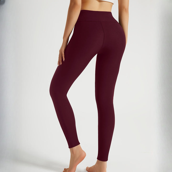 Women's plush-lined leggings in burgundy, side view