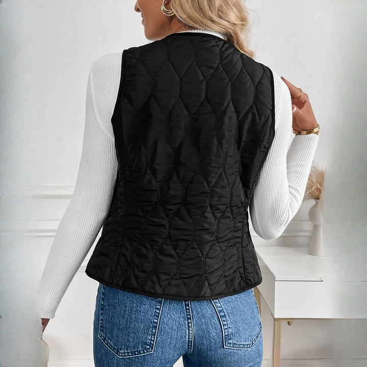 Women's quilted plush-lined gilet in black, back view