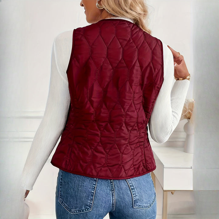 Women's quilted plush-lined gilet in burgundy, back view