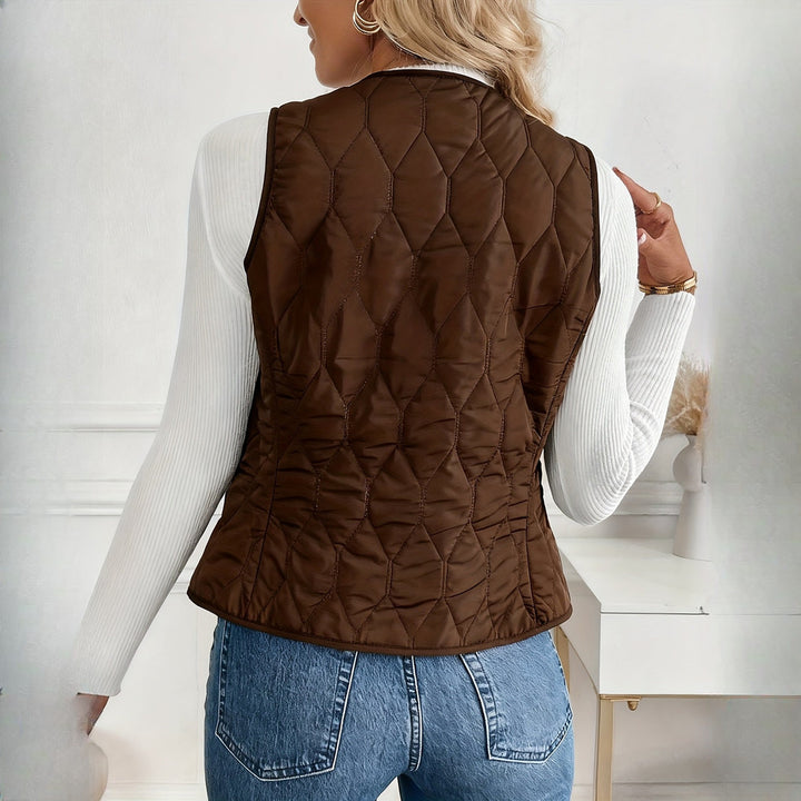 Women's quilted plush-lined gilet in coffee, back view