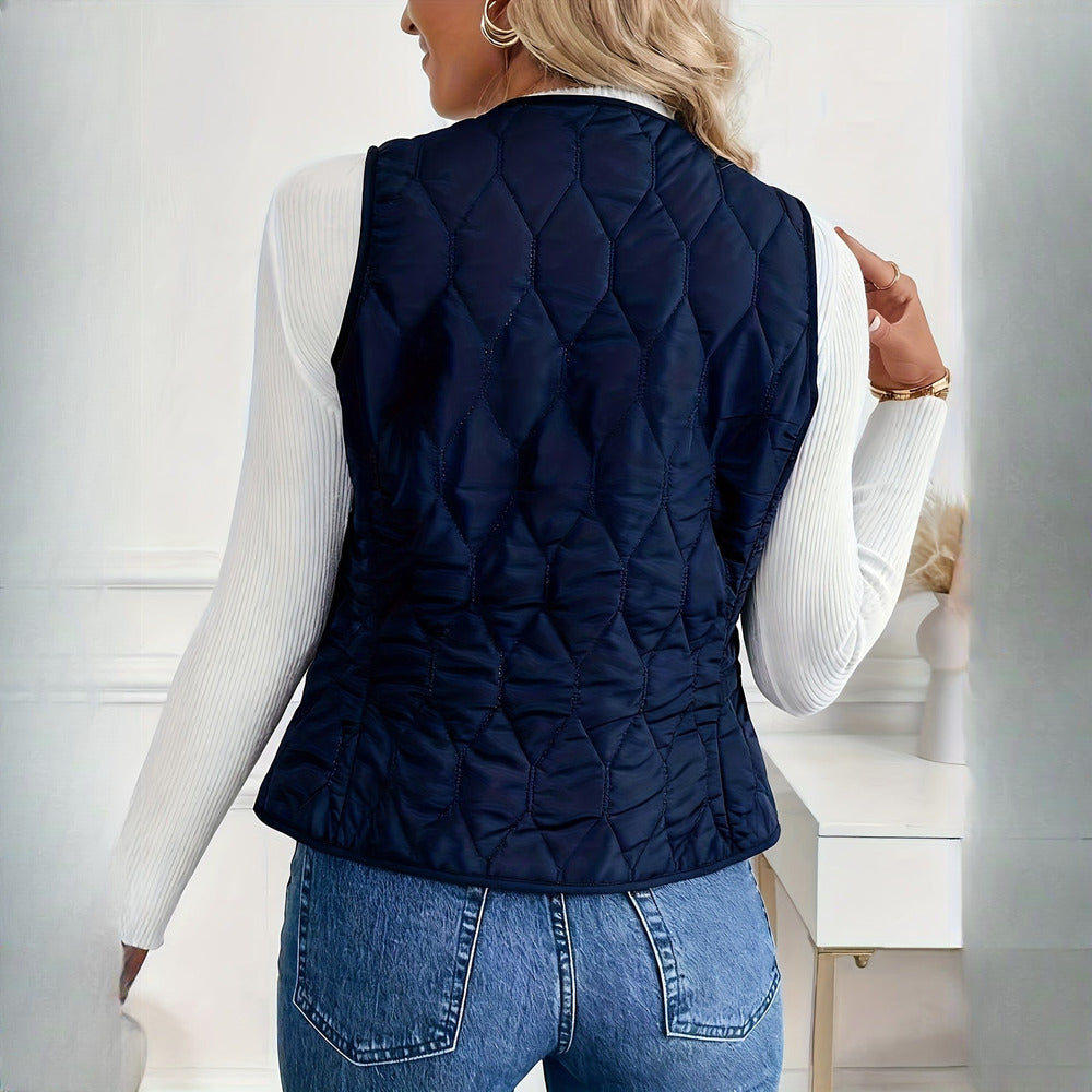 Women's quilted plush-lined gilet in navy, back view