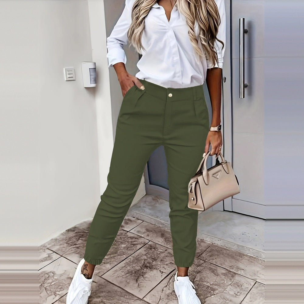 Women's slim-fit commuter trousers in fern green, worn on model