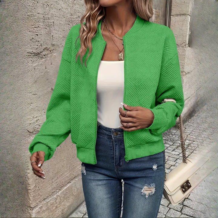 Women's textured zip-up jacket in green, front view