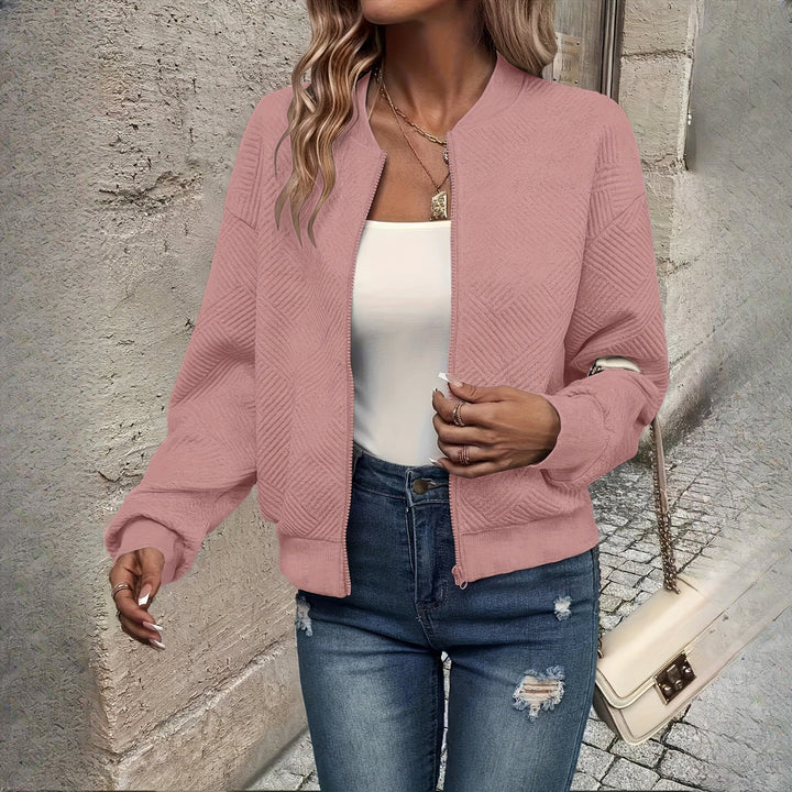 Women's textured zip-up jacket in pink, front view