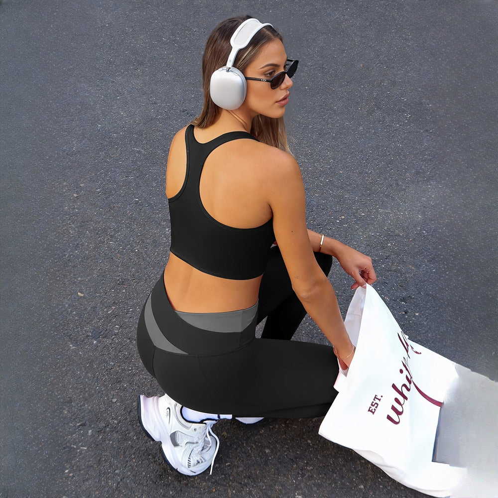 Women's two-piece activewear set in black, back view
