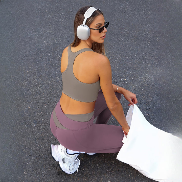 Women's two-piece activewear set in mauve, back view