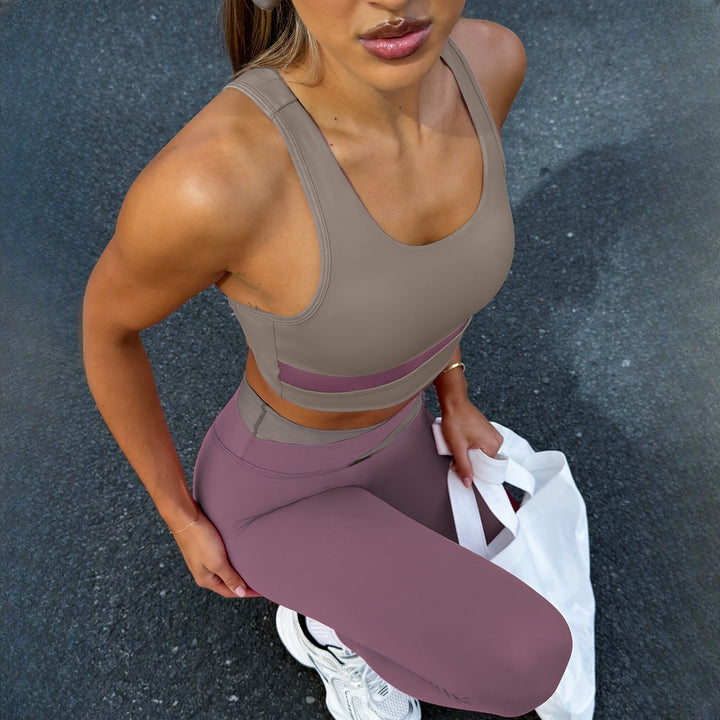 Women's two-piece activewear set in mauve, side view