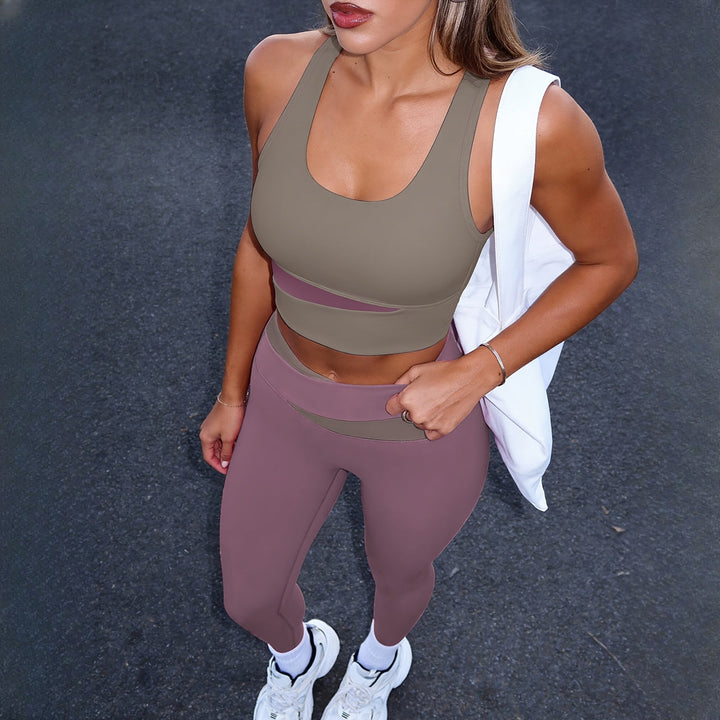 Women's two-piece activewear set in mauve, worn on model