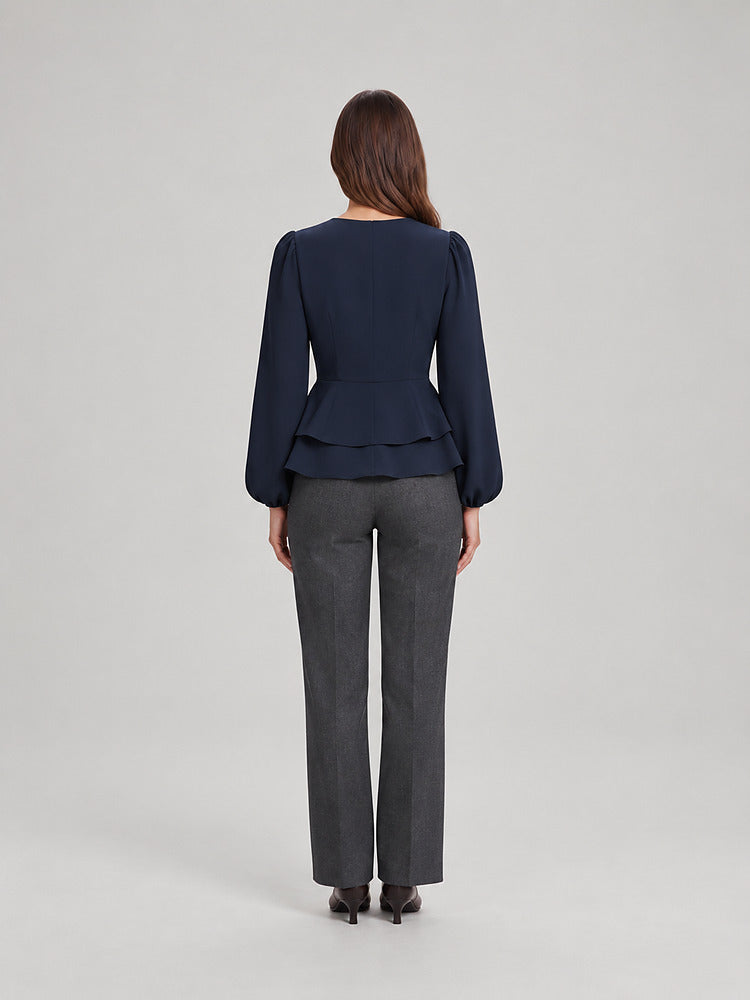 Women's wrap front peplum blouse with wide sleeves