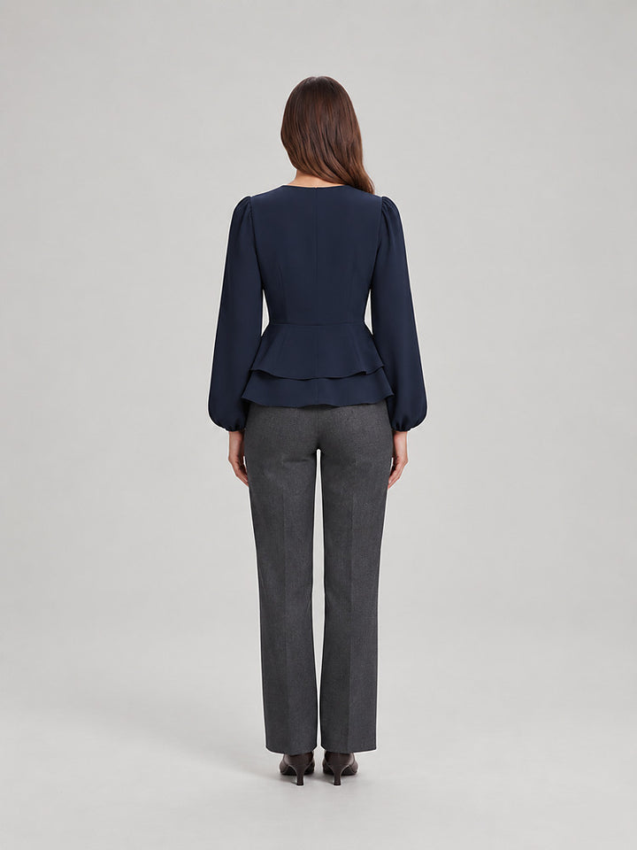 Women's wrap front peplum blouse with wide sleeves