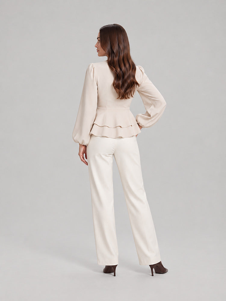 Women's wrap front peplum blouse with wide sleeves