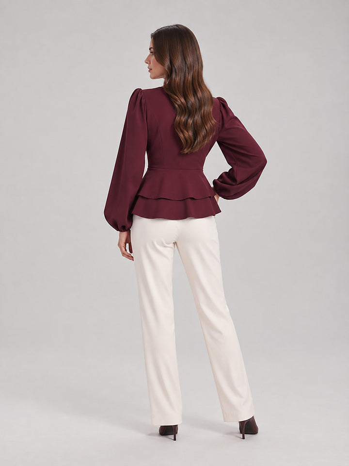 Women's wrap front peplum blouse with wide sleeves
